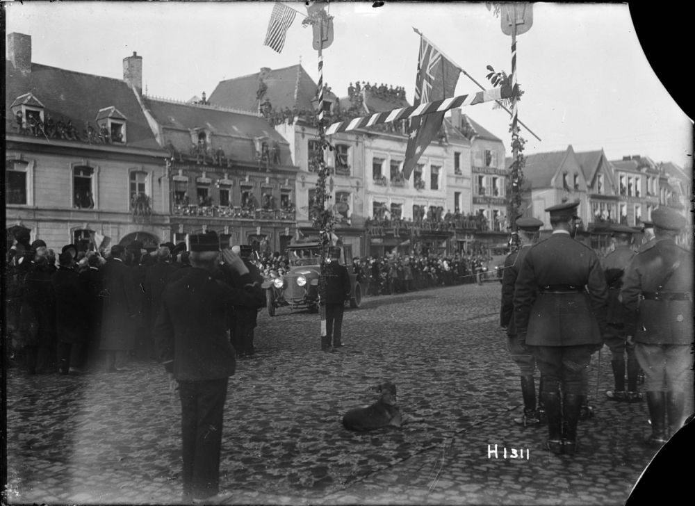 French President Raymond Poincaré visits New Zealand soldiers in the town centre after their successful capture of Le Quesnoy. November 1918.